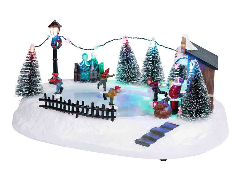Pueblo navideño con 11 LEDS con pista de patinaje